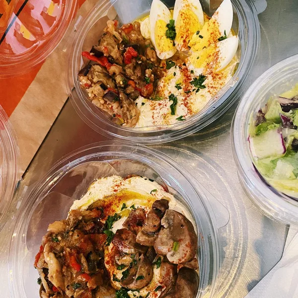 Ilan's Special takeaway — hummus, falafel, egg and mushrooms